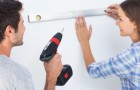 Woman and her husband measuring together