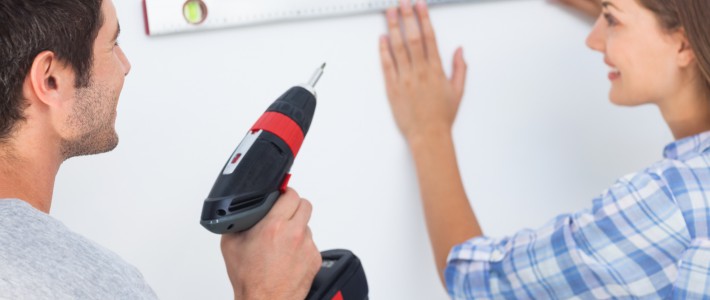 Woman and her husband measuring together
